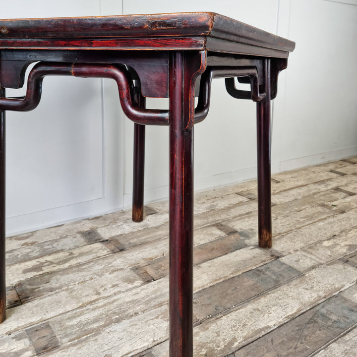 Rustic antique table with decorative accents