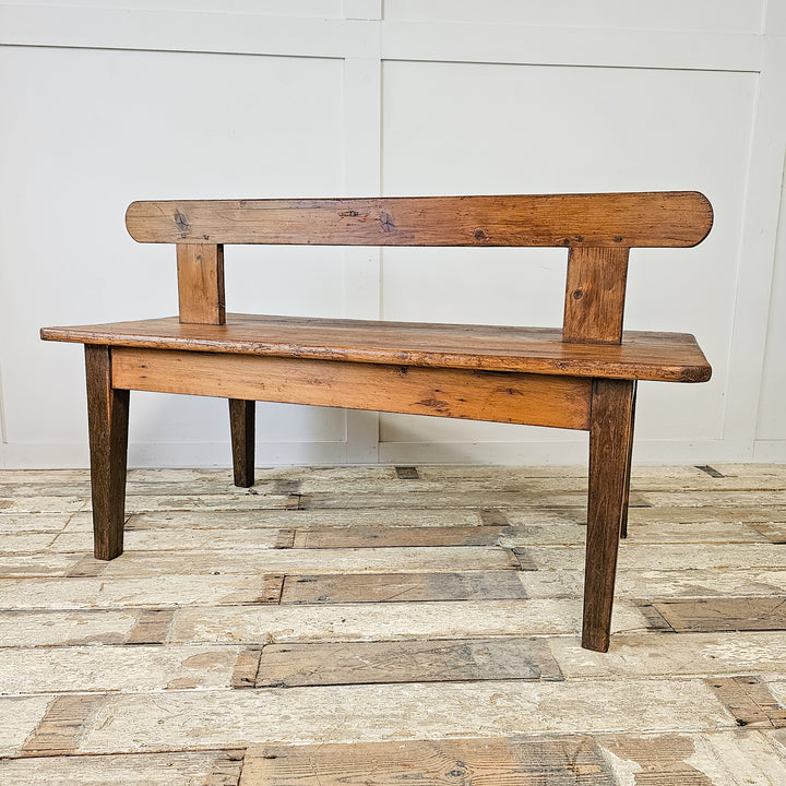 Antique Early 20th Century Pitch Pine Station Bench with Worn Patina and Central Backrest