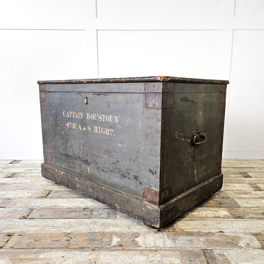 An antique pine Military Chest with two carrying handles, original paintwork and large internal storage capacity. Perfect as a blanket chest at the end of a bed or as a coffee table in the living room.