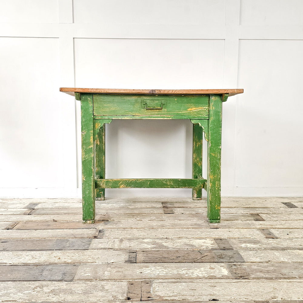 A small antique pine prep table from the early 20th century with green painted base and waxed pine top - Front View