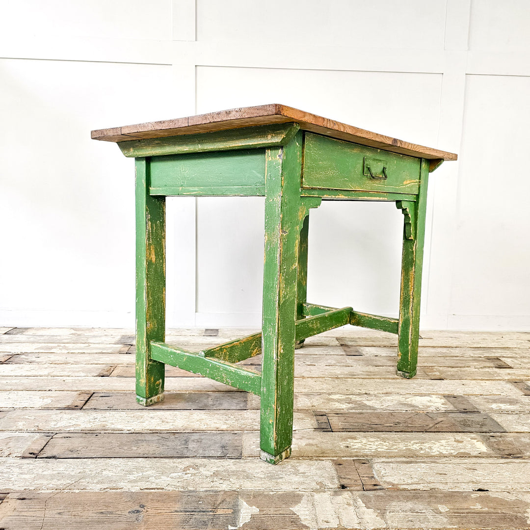 A small antique pine prep table from the early 20th century with green painted base and waxed pine top - Angled View 2