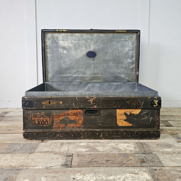 Antique Pine Military Chest with original zinc lining, metal straps, and shipping labels. Rich history embodied in versatile storage.
