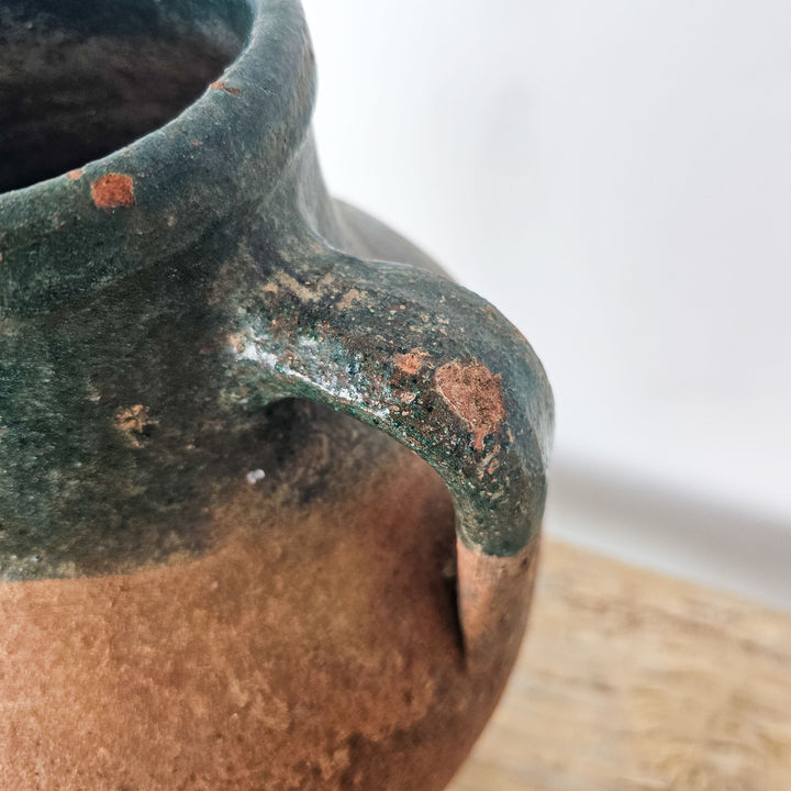 Vintage glazed earthenware pot with dark green rim, crafted in Turkey. Ideal for home décor or unique gifting