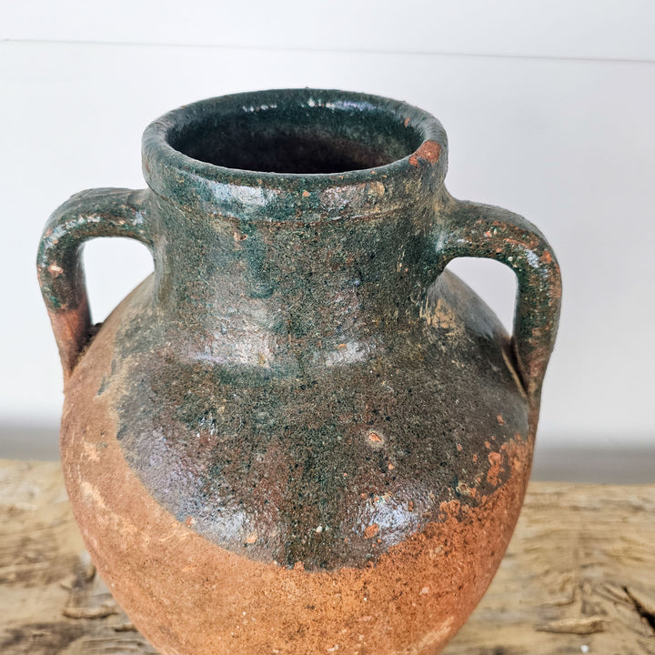Vintage Turkish Earthenware Pot with dark green glaze, two handles, and drilled hole for drainage. Perfect for rustic home decor.