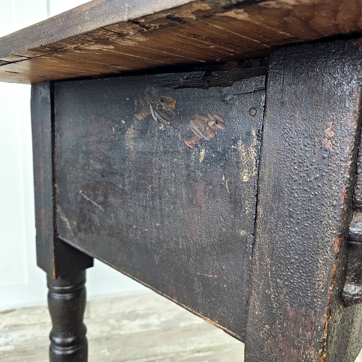 Whimsical antique console table with turned legs.