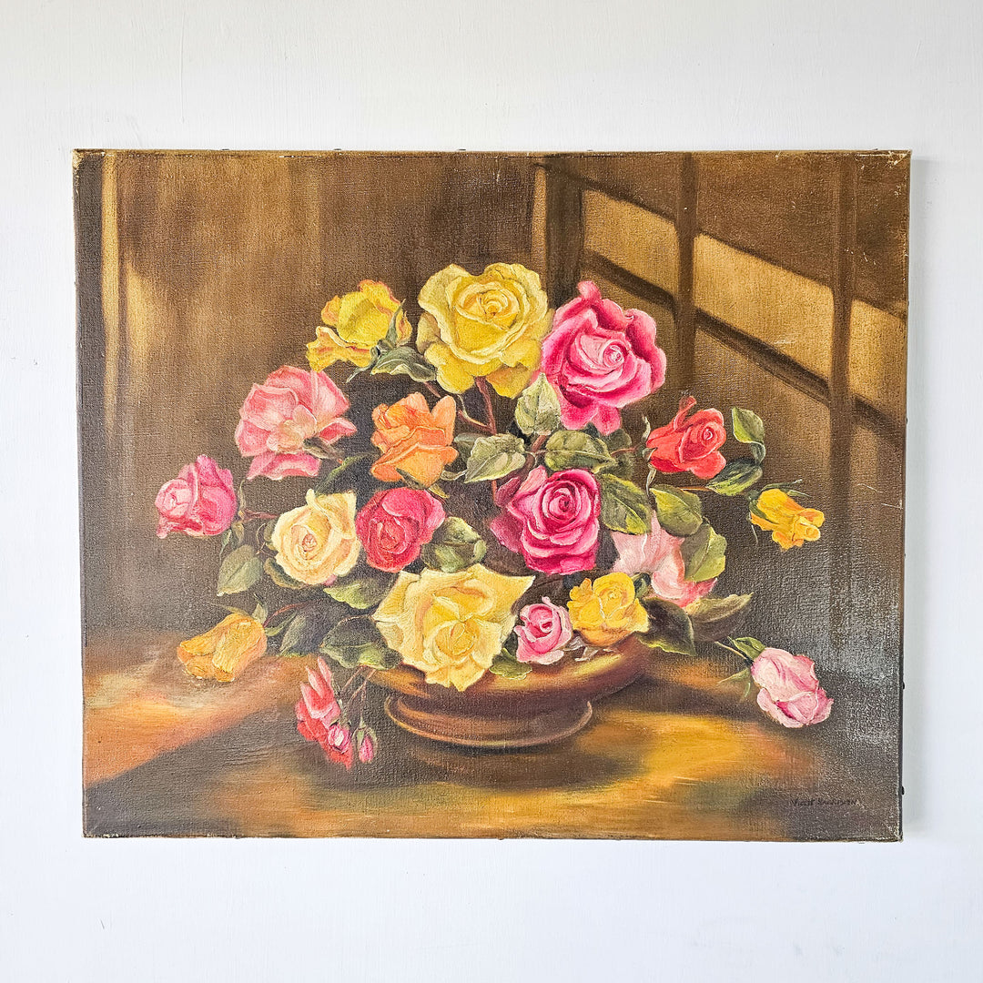 Frontal view of a vintage oil painting by Violet Harrison, featuring a lush array of roses in full bloom, with a wooden paneled backdrop casting shadows on the arrangement.