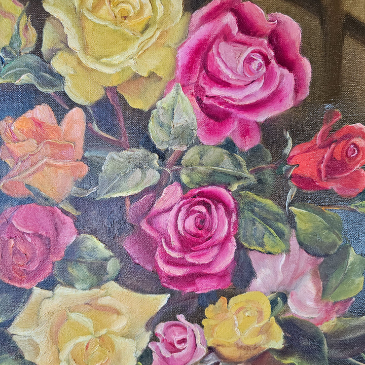 Detailed image of a section of a vintage floral oil painting, capturing the rich textures and diverse colors of roses ranging from deep reds to soft yellows against a dark background.