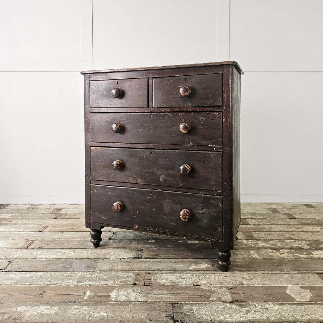 antique painted pine chest of drawers with five drawers and bun feet