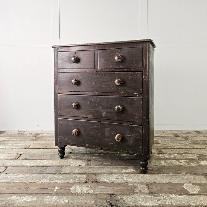 antique painted pine chest of drawers with five drawers and bun feet