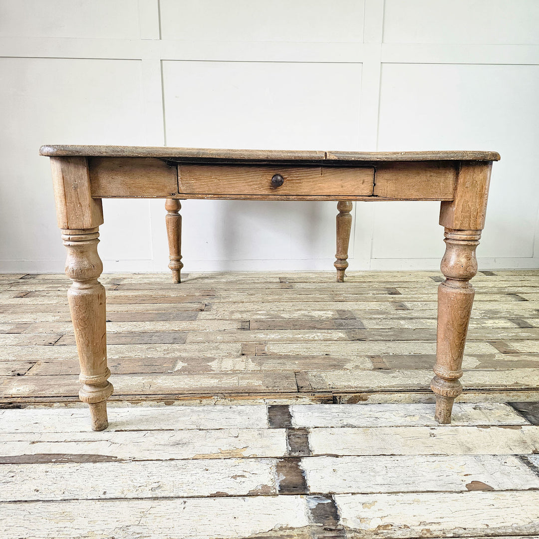 Vintage farmhouse table crafted from 19th-century pine, front view