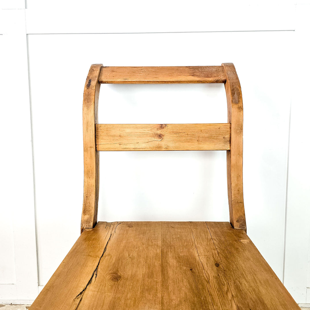 Sleigh-style French bench suitable as a day bed.
