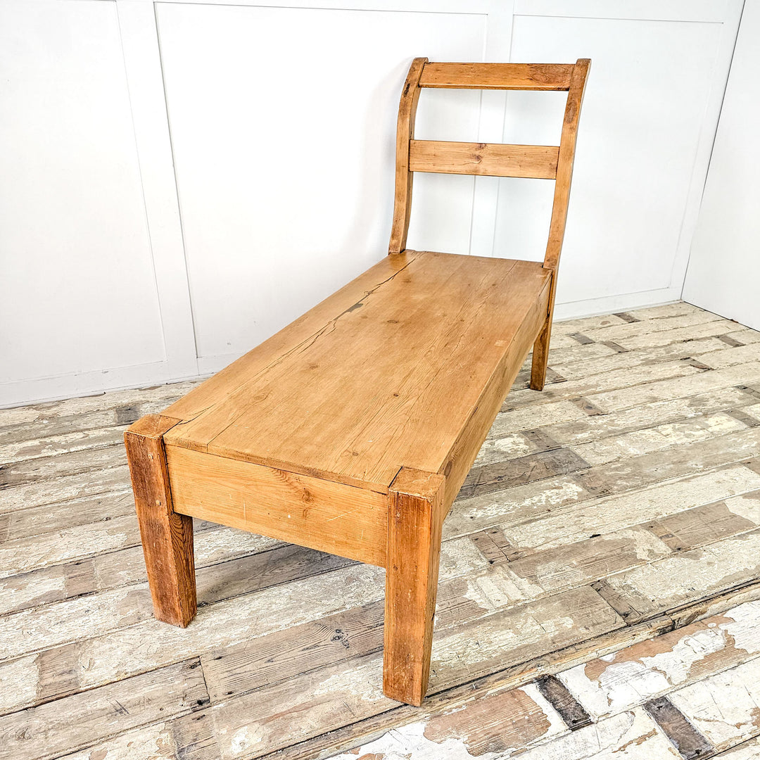 Early 20th-century rustic pine bench for hallways.
