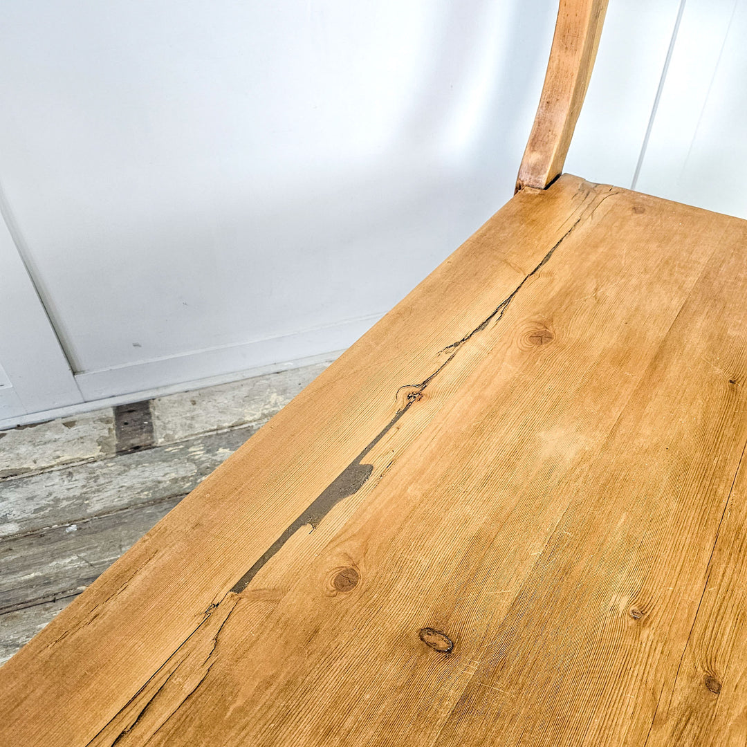 Curved backrest French bench in antique pine.
