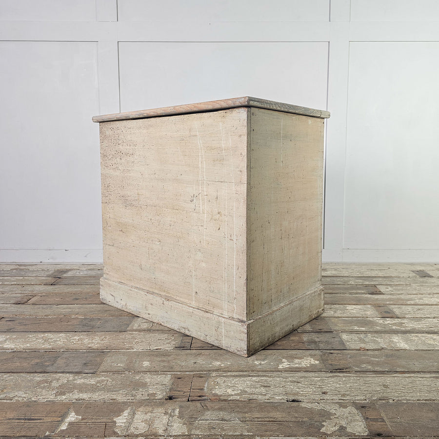 Antique French pine storage chest with original cream paint.
