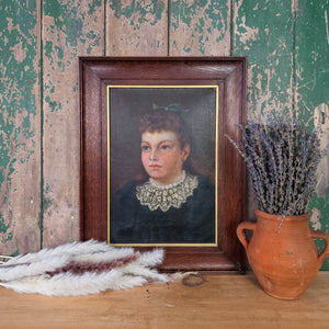 Framed oil painting of Edwardian girl