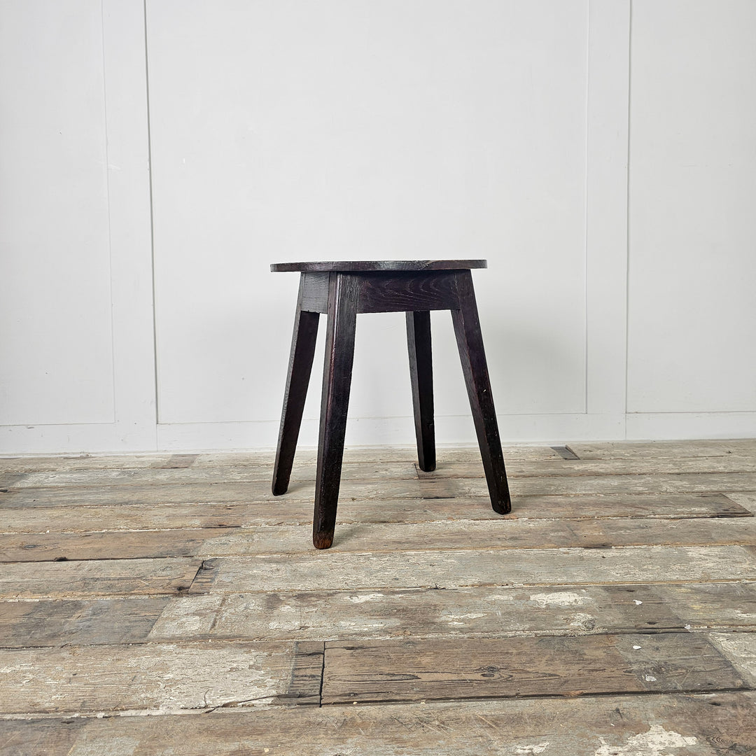 Farmhouse-style antique stools with characterful oak grain and comfortable proportions
