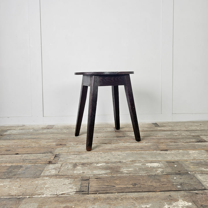 Farmhouse-style antique stools with characterful oak grain and comfortable proportions
