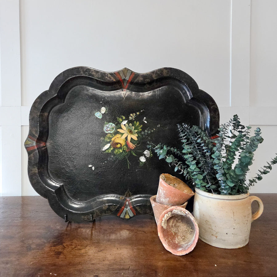 An antique Victorian serving tray in lacquered papier-mâché with vibrant floral decoration and shell inlay, a versatile decorative tray for use in dining spaces, hallways or as a mounted feature on a wall.