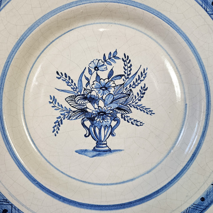 Ceramic plate with central urn motif
