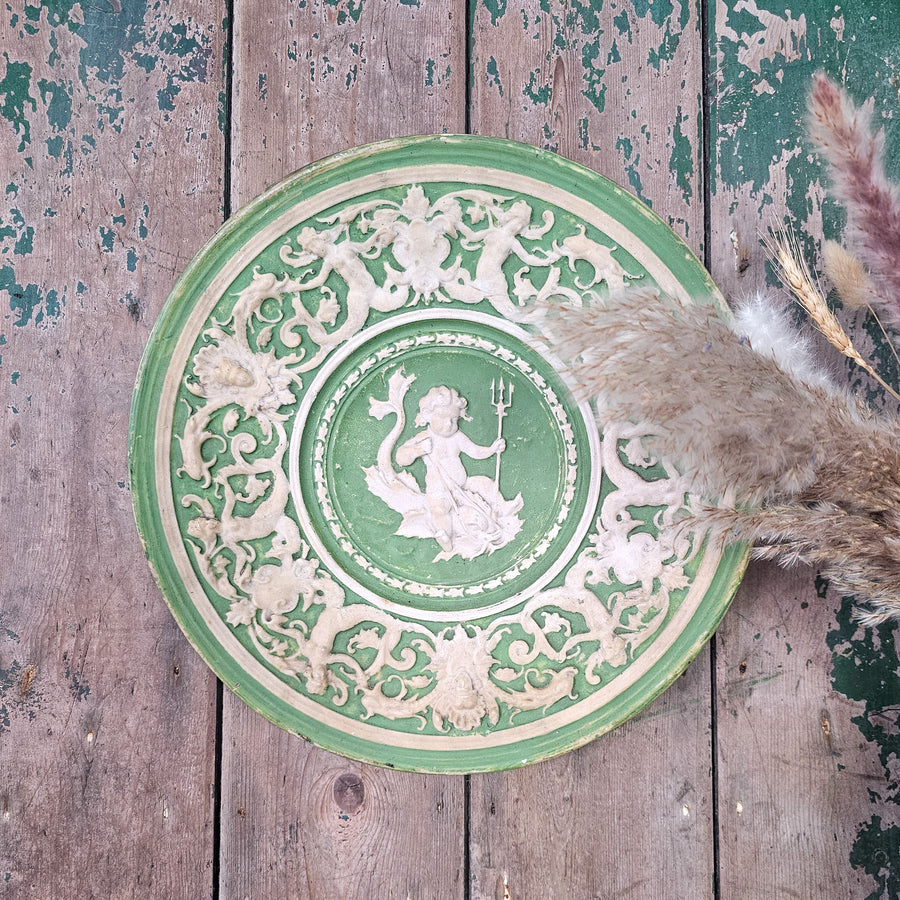 Vintage chalkware wall plaque in green and white
