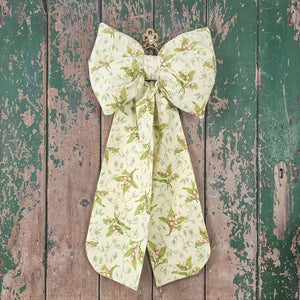 Decorative bow in pastel yellow and pink print