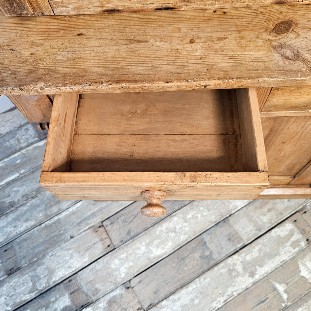 Antique pine display cabinet with glazed doors
