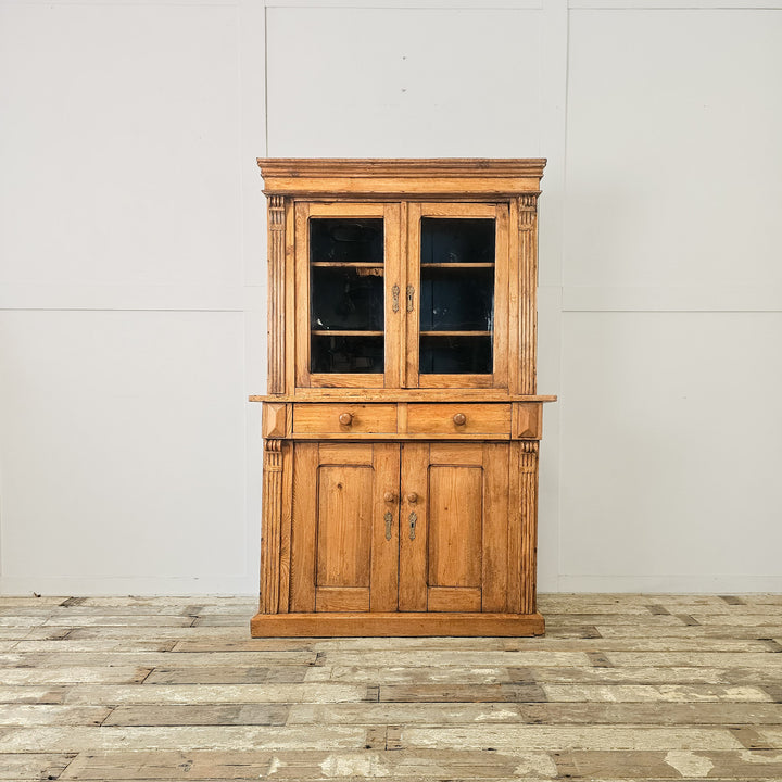 Glazed kitchen dresser with internal shelving
