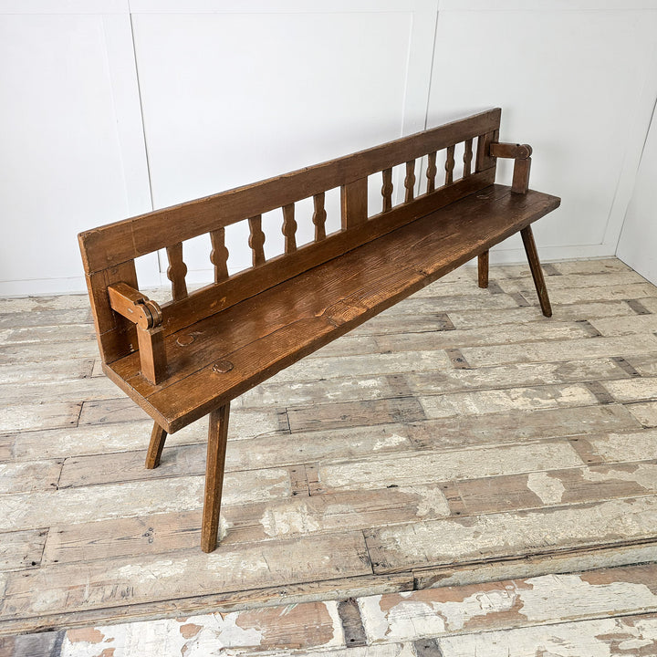 Early 20th century stick bench in brown paint