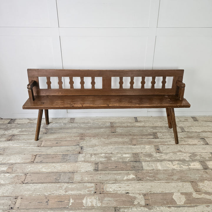 Vintage church bench with simple stick construction