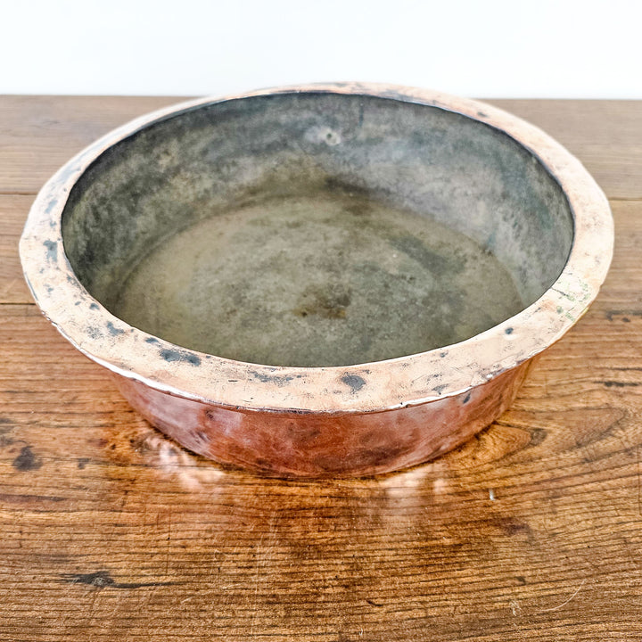 Small basin bowl for farmhouse-inspired spaces.