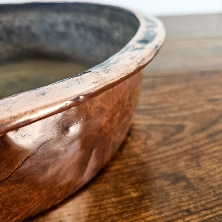Vintage copper basin bowl for rustic home accents.