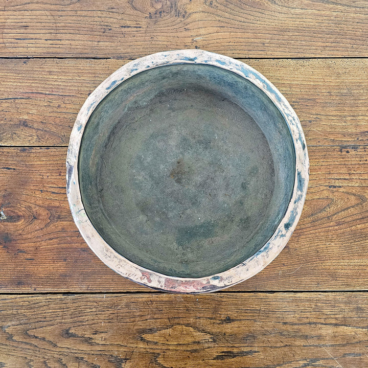  Small antique copper basin bowl with polished exterior.
