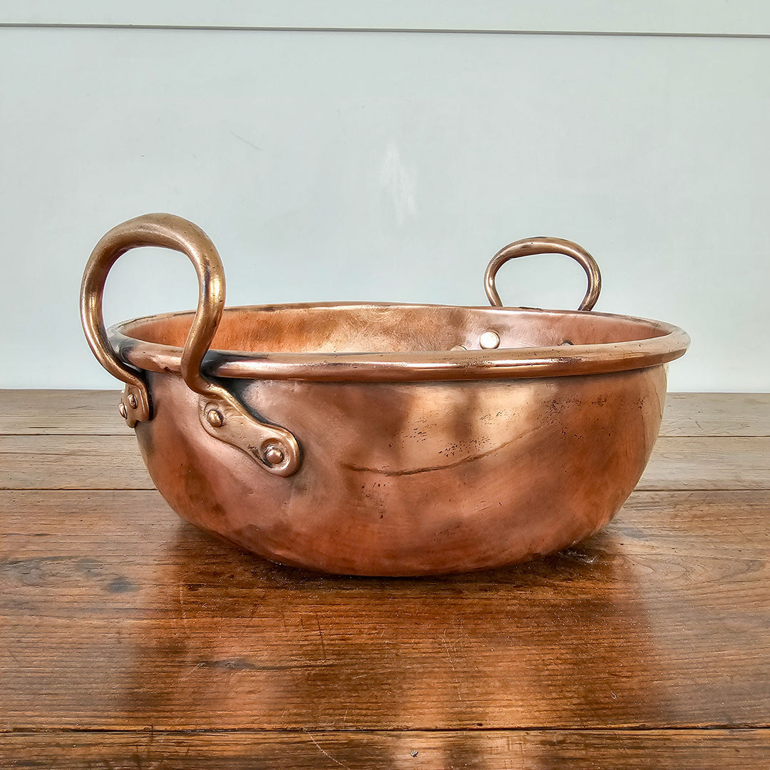 Antique copper pan perfect for farmhouse interiors.