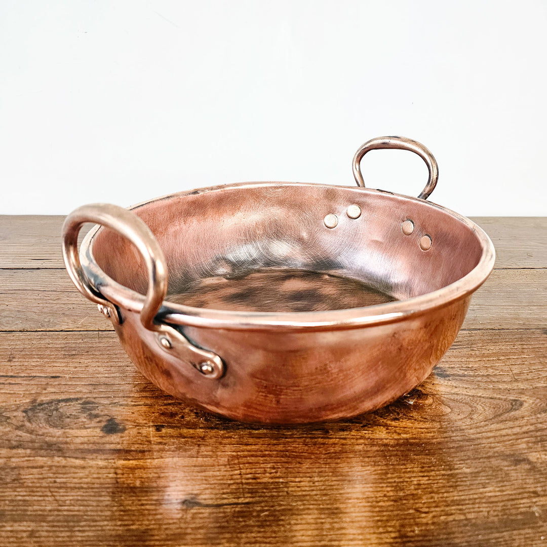Vintage Victorian copper pan with brass handles.