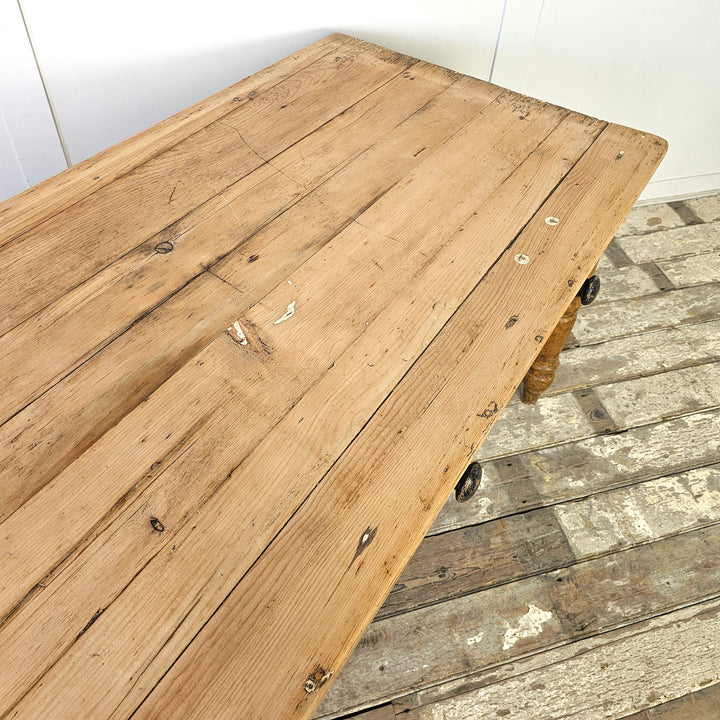 Rustic pine table with frieze drawers
