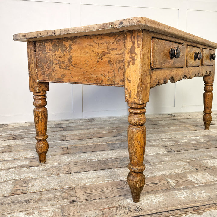 Victorian table with turned legs and storage