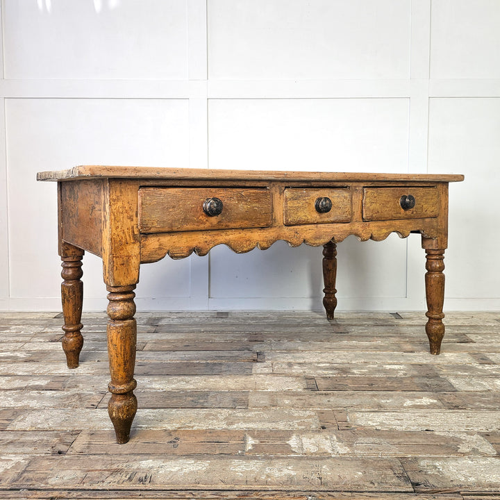 Rustic pine kitchen table with drawer fronts
