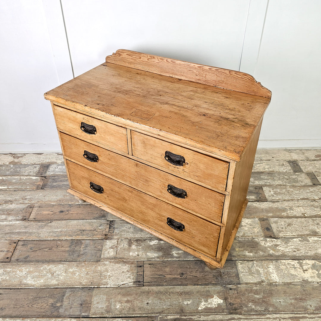 chest of drawers with brass handles
