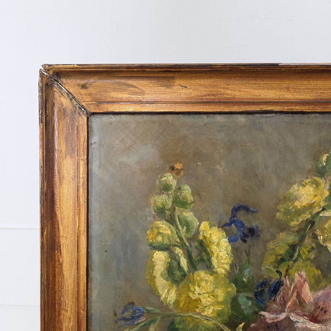 Early 20th-century impressionist floral oil painting signed by Canadian artist L Graham Smith. Depicts a fresh bouquet of garden flowers in oil on canvas with a simple painted gilt frame.
