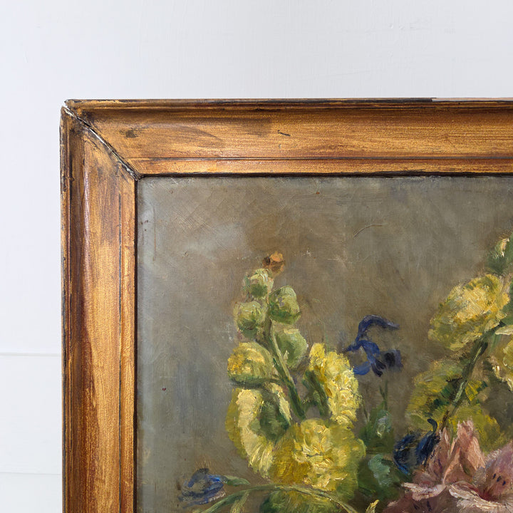 Early 20th-century impressionist floral oil painting signed by Canadian artist L Graham Smith. Depicts a fresh bouquet of garden flowers in oil on canvas with a simple painted gilt frame.
