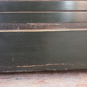 An antique early 20th century painted pine chest with four drawers arranged two over two. The chest is finished in dark green paint with lined detailing across the drawer fronts and sides, brass handles to each drawer, and a painted sailing ship scene to the top. Constructed in mahogany veneer and useful as hallway storage.