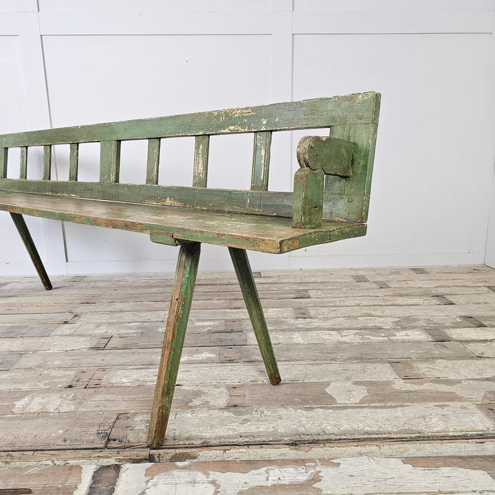 Primitive Romanian pine bench with dry green finish

