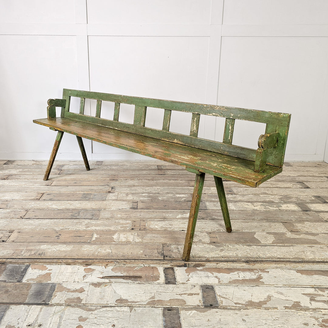 Early 20th century painted pine bench with flip-backrest
