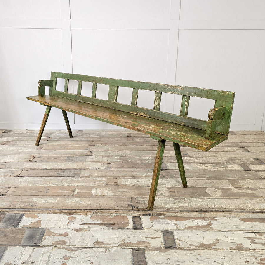 Early 20th century painted pine bench with flip-backrest
