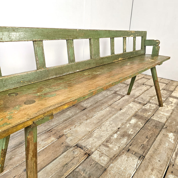 Eastern European church bench with pivoting back

