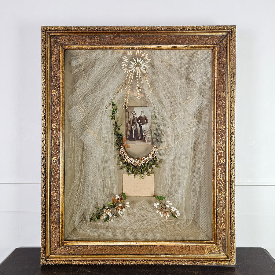 Early 20th century wedding shadow box with veil and floral crown
