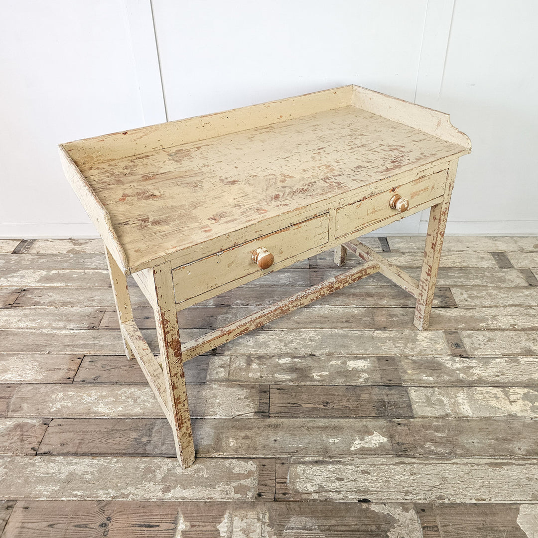 Painted pine table with original finish
Late 1800s French table with frieze drawers
