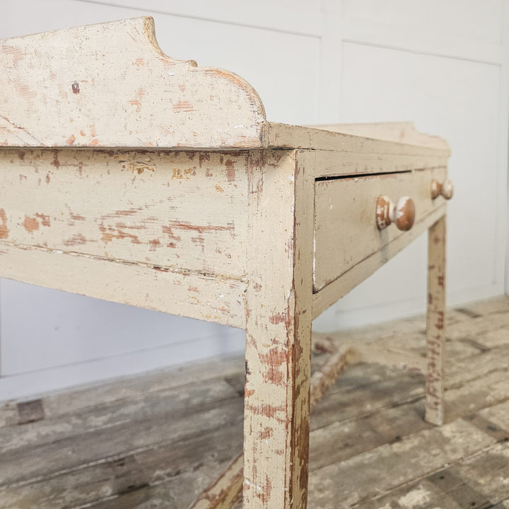 Pine console table with cream painted surface

