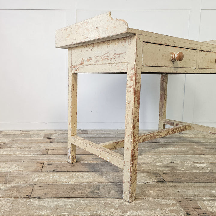 Rustic painted pine table with original detailing
