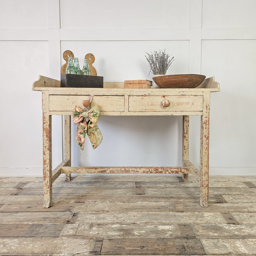 19th century painted pine table with gallery top
